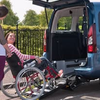 Wheelchair accessible parking and vehicle